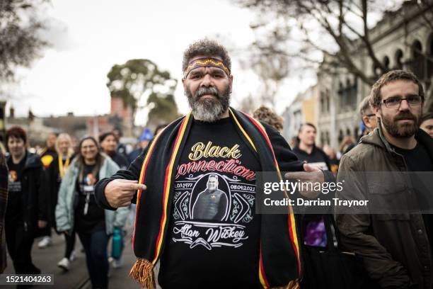 Proud Bundjalung Jinibarra Man Kevin Ellis takes part in the NAIDOC March on July 07, 2023 in Melbourne, Australia. NAIDOC Week is an Australian...