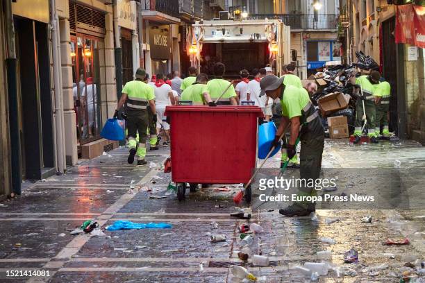 Cleaning services after the first running of the bulls of the Fiestas de San Fermin 2023, with bulls from Puerto de San Lorenzo, on July 7 in...
