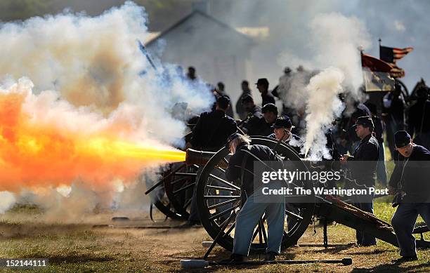 Union Army Re-enactors take part in a recreation entitled "Dunker Church" as people gather to mark the 150th anniversary of the Battle of Antietam on...