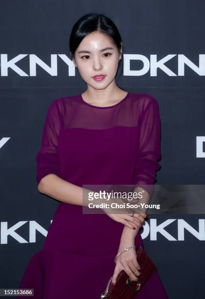 Min Hyo-Lyn poses for photographs upon arrival during DKNY 2012 F/W Collection at Cheongdam-dong DKNY flagship store on August 31, 2012 in Seoul,...