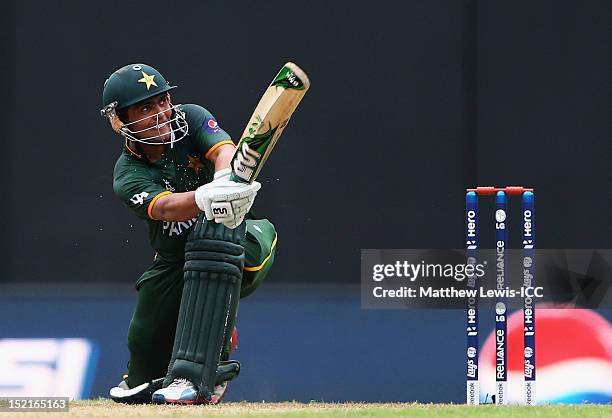 Kamran Akmal of Pakistan hits a six during the ICC T20 World Cup warm up match between India and Pakistan at the R Premadasa Stadium on September 17,...