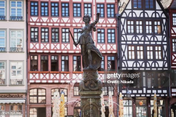 statue of justitia, old town in frankfurt am main, germany - ostzeile stock pictures, royalty-free photos & images