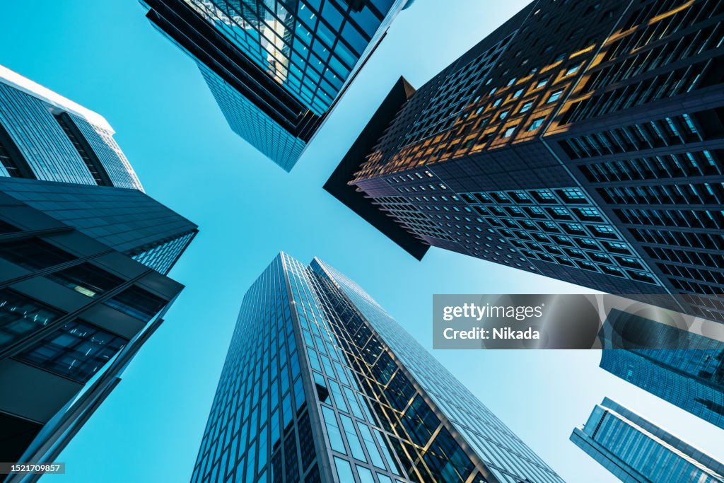 Modern bank towers in Frankfurt at late afternoon, captured in wide angle
