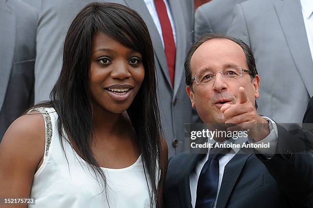 France's President Francois Hollande poses for a picture with a French Olympic athlete at Elysee Palace on September 17, 2012 in Paris, France.