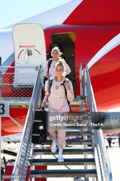 Alex Greenwood and Ellie Roebuck of England react as players of England arrive in Australia on July 07, 2023 in Sunshine Coast, Australia.