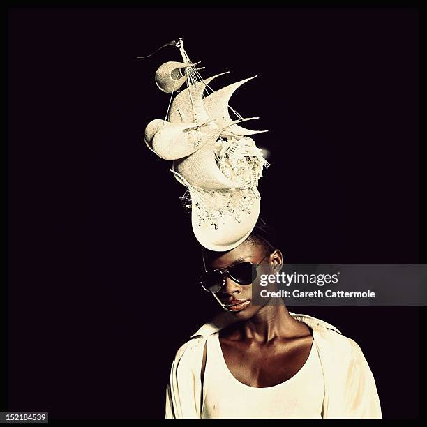 Model showcases designs on the catwalk by Philip Treacy on day 3 of London Fashion Week Spring/Summer 2013, at The Royal Courts Of Justice on...