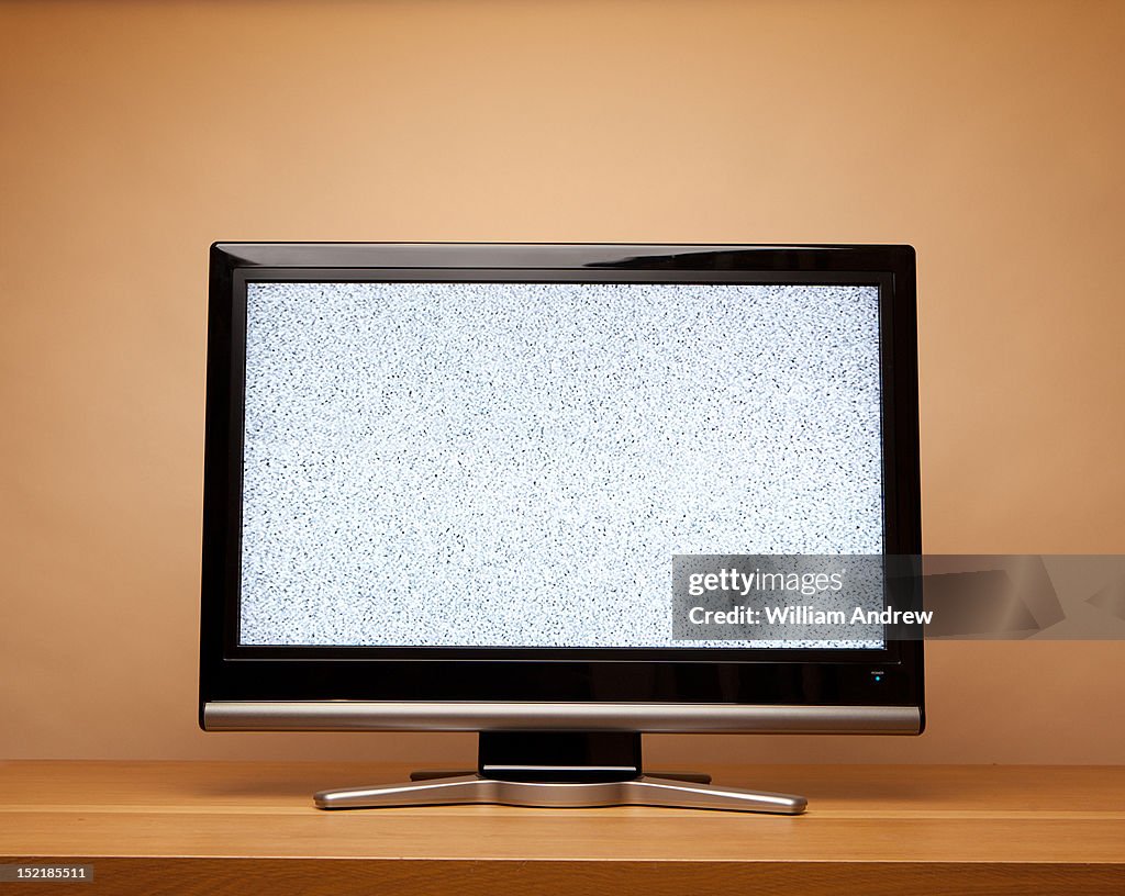 Flat screen TV with no signal, noise on screen