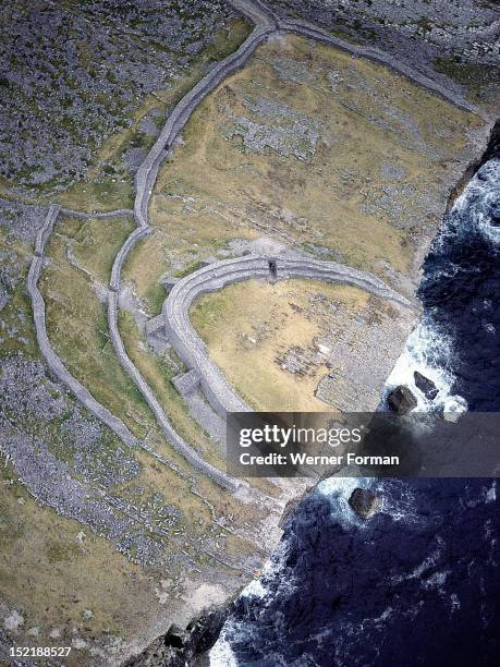 Aerial view of the Fort of Dun Aengus, The fort is encirled by a triple line of high drystone walls. Said to be built by the mythical race, the Fir...