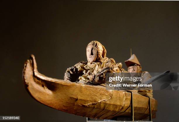 Two figures in a kayak a soul boat, USA Alaska. Eskimo.