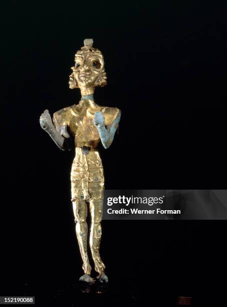 Canaanite gold and silver foil covered bronze figure of Baal, In Canaan the name Baal was given to a number of senior male deities whose true names...