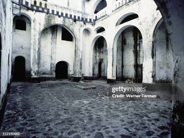 Inside the ramparts of Elmina Castle, Built in 1482 by the Portuguese, the castle was used by them and then by the Dutch and the English as a base...