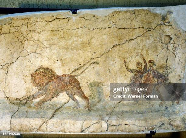 Painting of a lion hunt, From the cemetery of Isola Sacra near Ostia. Hunts of exotic and wild animals were common place in the roman arenas. Italy....