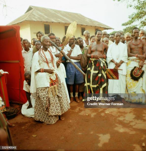 Chiefs and court officials participating in one of the major royal and civic rituals of Benin City, Nigeria. Edo. 24 December 1964. Benin City.