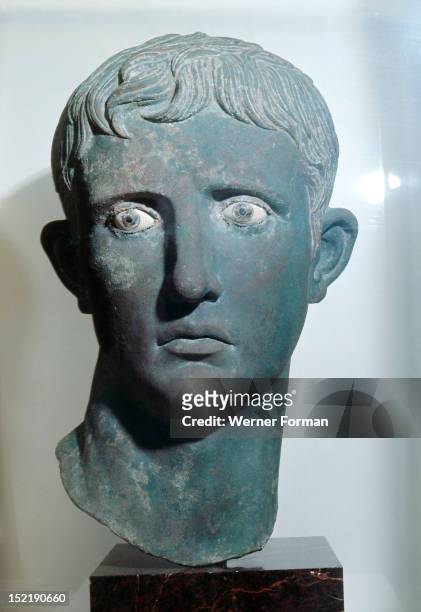 Head of Emperor Augustus from a colossal bronze statue, an example of the highly skilled workmanship characteristic of Greek craftsmen, The head was...