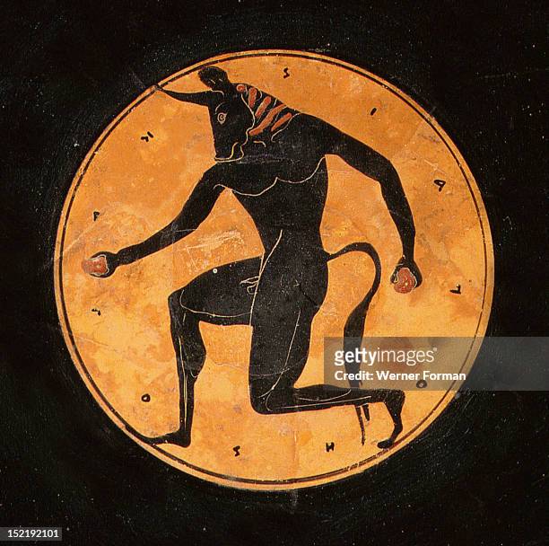 Attic, bilingual, eye cup with black figure interior depicting running minotaur and inscription reading the boy is beautiful, Exterior painting...