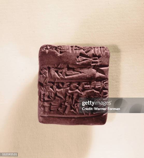 Letter in cuneiform writing, The cuneiform signs are written from left to right and are pressed into the soft clay tablet with the slanded edge of a...
