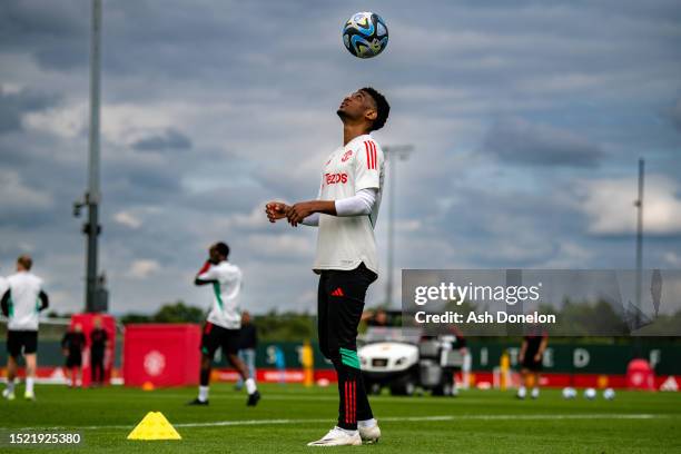 Amad of Manchester United in action during a pre-season first team training session at Carrington Training Ground on July 06, 2023 in Manchester,...