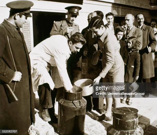 Second World War , The Allies spread food between Greek population with ration card, March 1940, Athens, Greece.