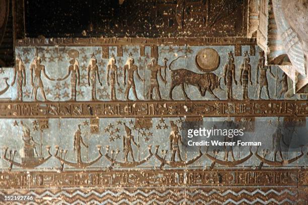 The ceiling inside the Hypostyle Hall of the Temple of Hathor contains vividly painted scenes and hieroglyphic inscriptions relating to astronomy,...