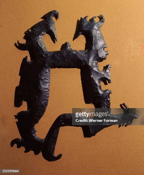 Eccentric axes with human silhouettes, They may have formed part of staffs of office carried by nobility. Mexico. Maya. 9th C, late classic period.