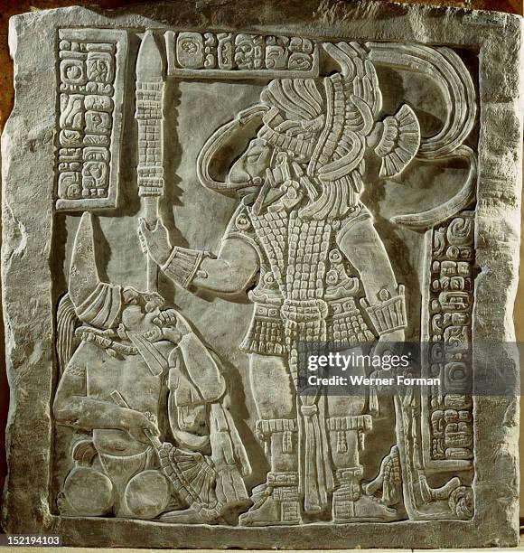 Lintel 16 of Yaxchilan Structure 21, from a series illustrating the accession rituals of the ruler Lord Bird Jaguar, Here Bird Jaguar stands over a...
