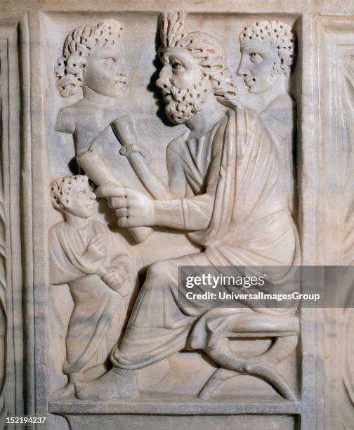 Pedagogue's sarcophagus, Relief depicting a teacher with his students, III century A.C, National Archaeological Museum, Tarragona, Catalonia, Spain.