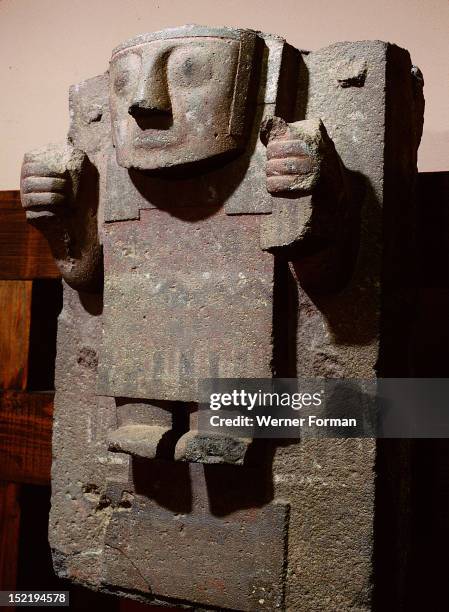 Stele from Tiahuanaco showing Viracocha, the Staff God, a celestial creation deity, The square eyes and rectangular mouth are typical of Tiahuanaco...