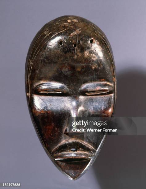 Mask of a type called Tankagle, which probably depicts a handsome young man, Often accompanied by musicians, they entertain spectators with dance,...