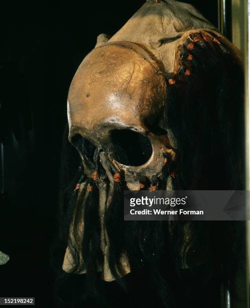 Shamans mask/headdress made from the front section of a human skull, Excavated from the necropolis of Hopewell burial mounds known as Mound City....