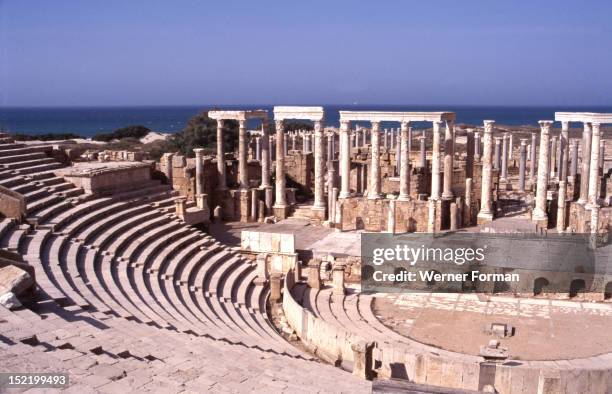 The theatre at Leptis Magna, Built in AD 1-2 in typical Augustinian style, it was subsequently renovated by the emperor Caracalla . Libya. Roman. 1...