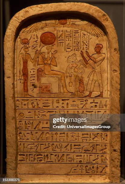 Egyptian Art, Stele depicting a priest making an offering to the god Ra Behind him, the goddess Isis, 22nd Dynasty, Third Intermediate Period, Luxor...