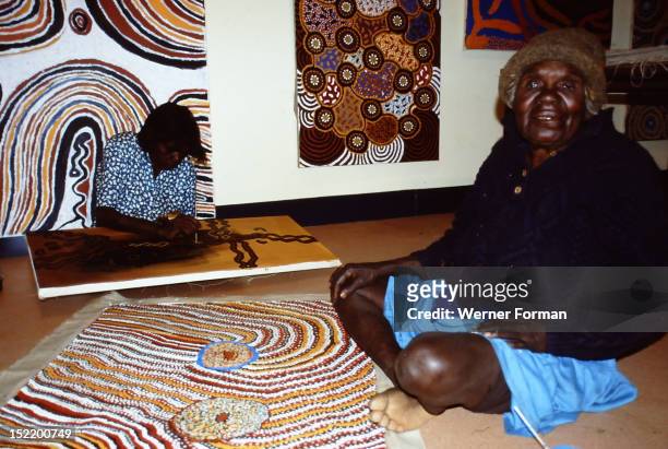 Balgo Community artist, the late Mati Mudgedell, working on a dot painting at the Warlayirti Culture Centre in the north-west desert region of...