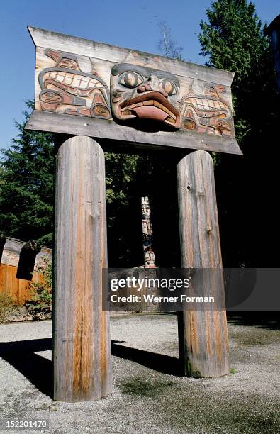 The approach to a Haida Indian Longhouse, It was previously on Queen Charlotte Island. Northwest Coast of America. Haida Indian. British Columbia,...