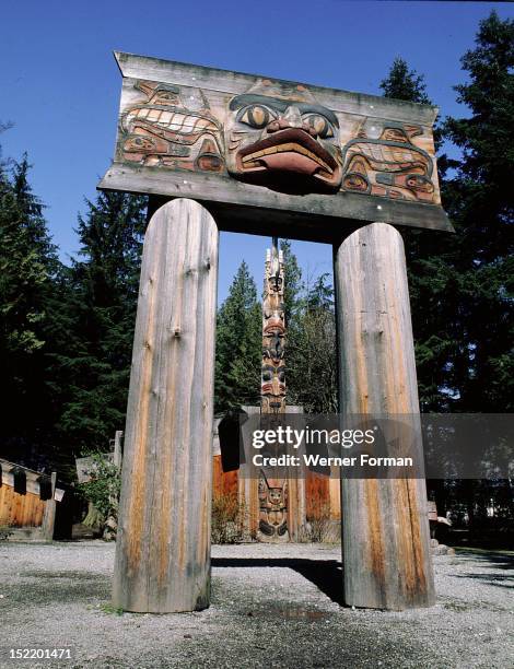 The approach to a Haida Indian Longhouse, It was previously on Queen Charlotte Island. Northwest Coast of America. Haida Indian. British Columbia,...