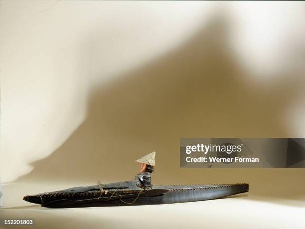 Model of an Aleut hunter in his kayak, Eskimo. 19th c .