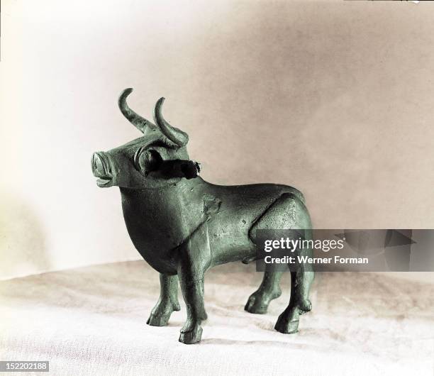 Cast of a small bull figurine found in a cave of the Moravian Karst, Could have been used as a substitute for a real animal sacrifice. Czech...