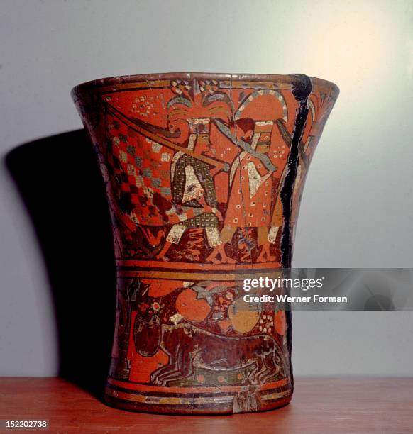 Ritual drinking vessel known as a kero, It is of hybrid Inca Spanish style. The upper register shows two Inca dignitaries, while the lower register...