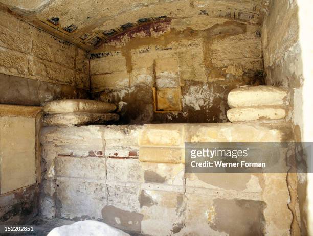 The extensive complex of burial chambers at Kom el Shuqafa, In corridors off the main burial chambers are scores of loculi built to hold humbler...