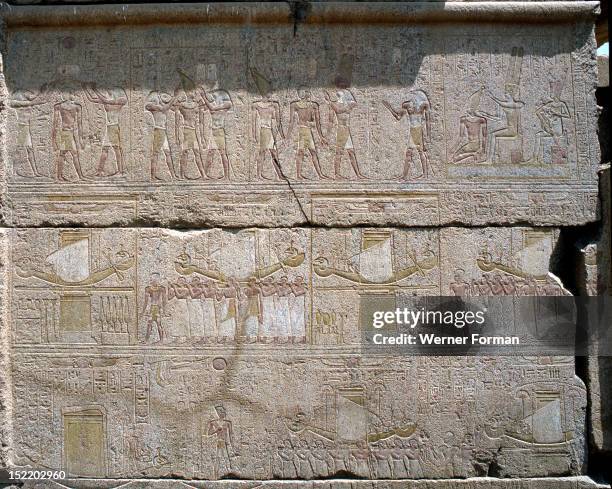 Relief on the southern outside facade of the naos of Philip Arrhidaeus, Karnak, Top register shows the purification & crowning of the king by Thoth &...