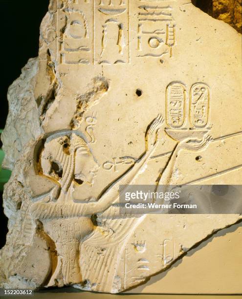 Detail of a relief showing Nefertiti worshipping the Aten, One of Atens rays ends in a human hand that offers the queen the ankh symbol of life in...