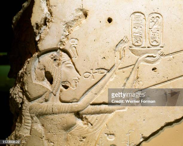 Detail of a relief showing Nefertiti worshipping the Aten, One of Atens rays ends in a human hand that offers the queen the ankh symbol of life in...
