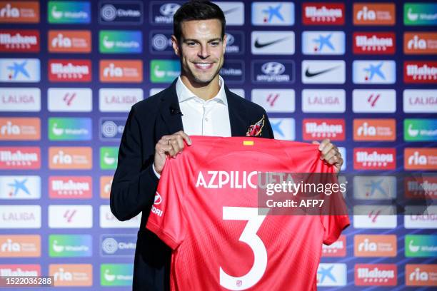 Cesar Azpilicueta poses for photo during his presentation as new player of Atletico de Madrid celebrated at Civitas Metropolitano stadium on July 07...