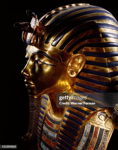 The mask of Tutankhamun, Close up, three quarter view. Egypt. Ancient Egyptian. 18th dynasty c 1357 1349 BC.