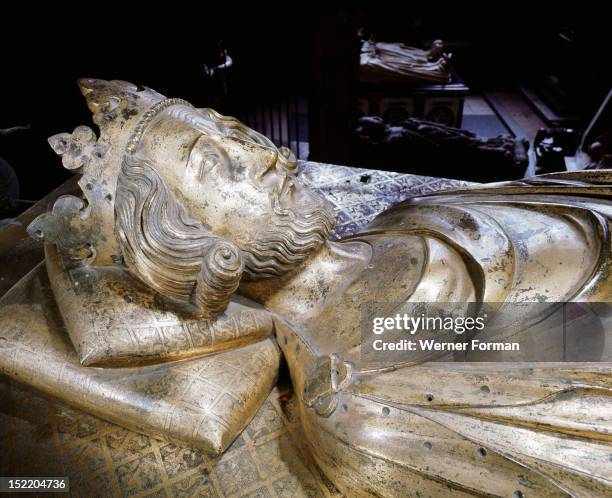 Westminster Abbey, Tomb of Henry III, commissioned by his son Edward I in about 1291. The gilt bronze effigy by William Torel is set on a high plinth...