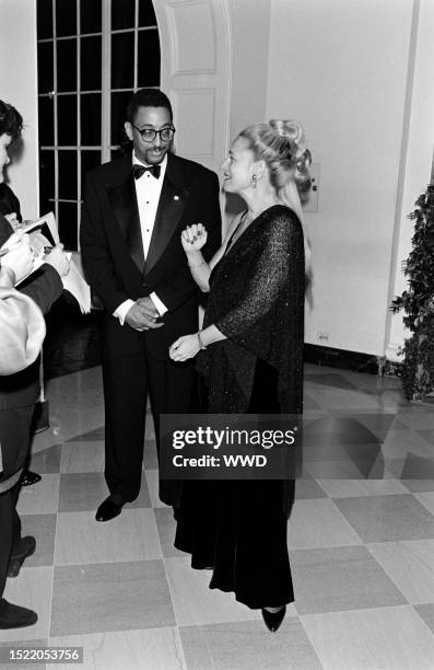 Gregory Hines and Pamela Koslow attend an event at the White House in Washington, D.C., on November 23, 1993.