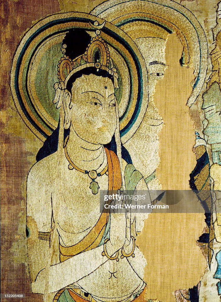 Detail of an embroidered silk banner of the Buddha Sakyamuni preaching on Vulture Peak
