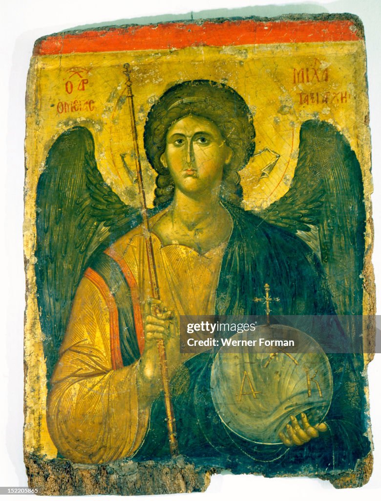 An icon with the image of the Archangel St Michael holding a staff and a globe surmounted by the Cross