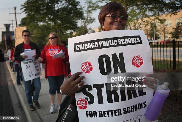 Striking Chicago public school teachers picket outside of George Westinghouse College Prep high school on September 17, 2012 in Chicago, Illinois....