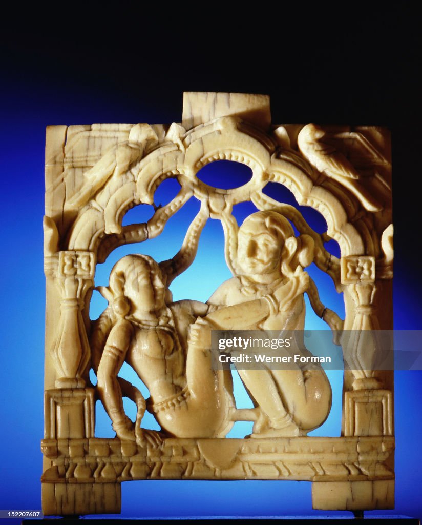 An ivory panel, probably from a bed or a swing, carved with a tantric scene