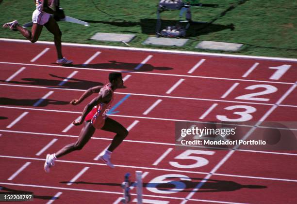 The American sprinter and long jumper Carl Lewis crossing the finish line of a race at Los Angeles Olympics. Los Angeles, August 1984